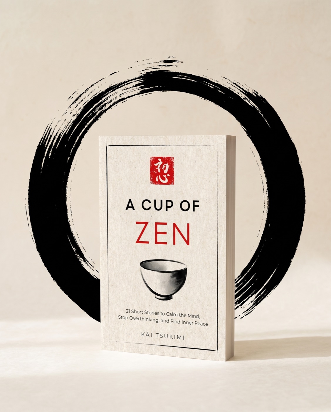 A Cup of Zen paperback standing before a large black ensō ink circle