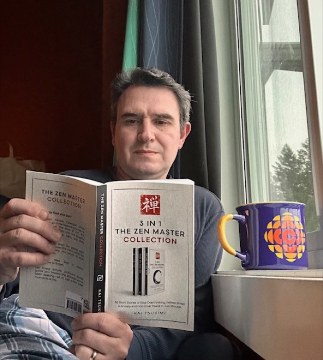 A reader with the Zen Storyteller books